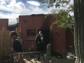 Firefighters rescue man from burning home